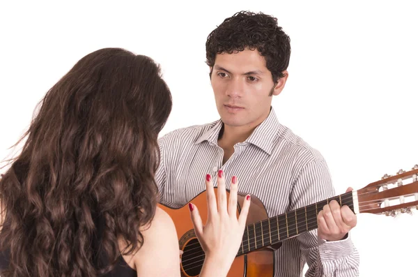 Handsome man with guitar serenading young girl — Stock Photo, Image