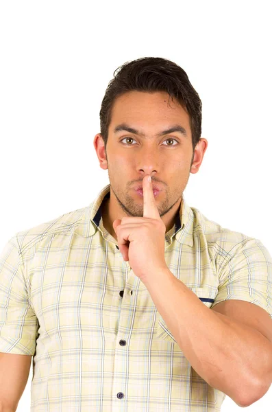 Young handsome hispanic man gesturing a secret — Stock Photo, Image