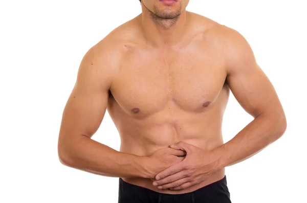 Muscular shirtless man with stomach pain — Stock Photo, Image