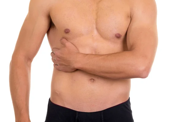 Muscular shirtless man with right abdomen pain — Stock Photo, Image