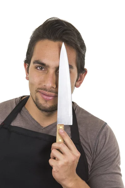 Handsome young male chef wearing black apron — Stock Photo, Image