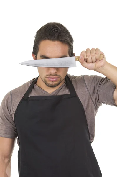 Bonito jovem chef masculino vestindo avental preto — Fotografia de Stock