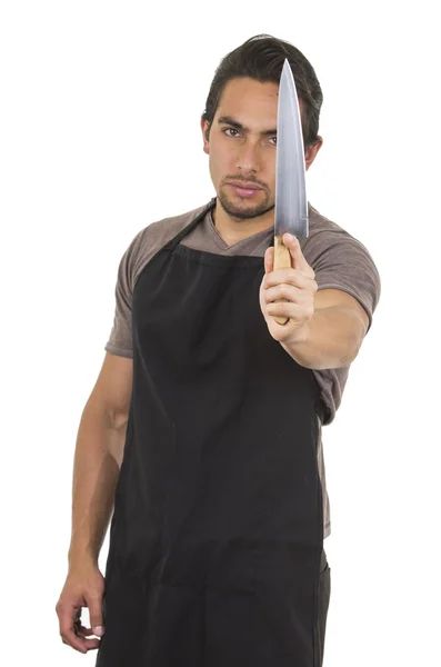 Przystojny młody kucharz mężczyzna ubrany czarny fartuch — Zdjęcie stockowe