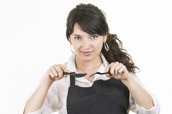 Jonge mooie vrouwelijke chef-kok zwart schort dragen — Stockfoto