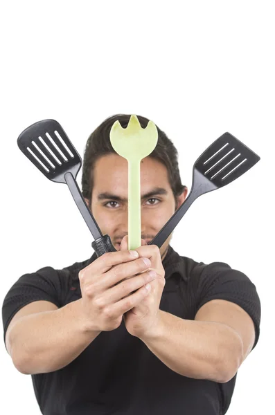 Handsome young male chef wearing black apron — Stock Photo, Image