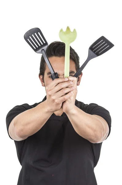 Guapo joven chef con delantal negro —  Fotos de Stock