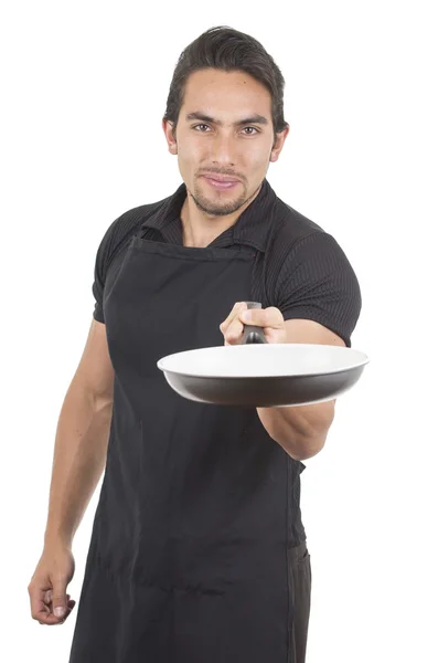 Bonito jovem chef masculino vestindo avental preto — Fotografia de Stock