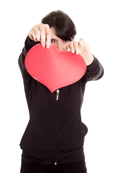 Hermosa niña triste sosteniendo un concepto de corazón rojo de angustia —  Fotos de Stock