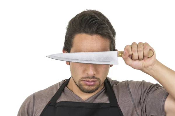 Handsome young male chef wearing black apron — Stock Photo, Image