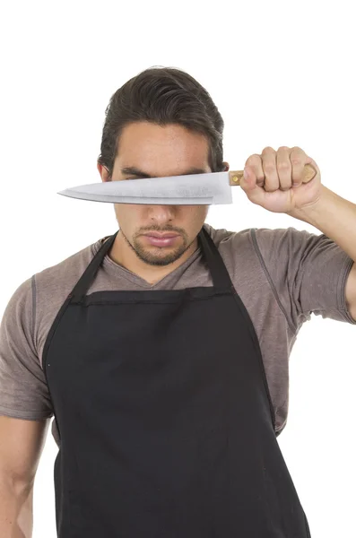 Handsome young male chef wearing black apron — Stock Photo, Image