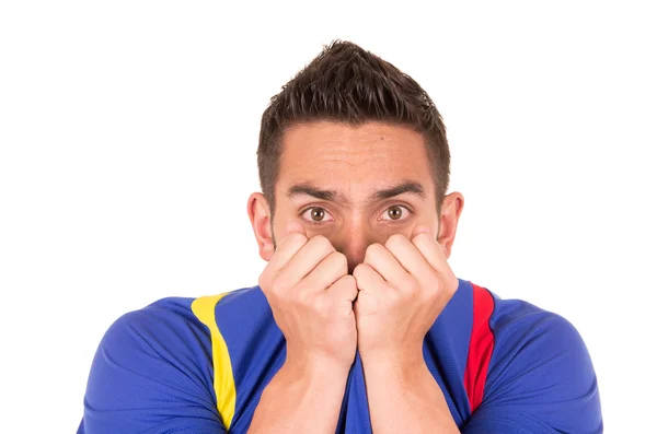 Nervous soccer fan wearing blue tshirt watching game — Stock Photo, Image