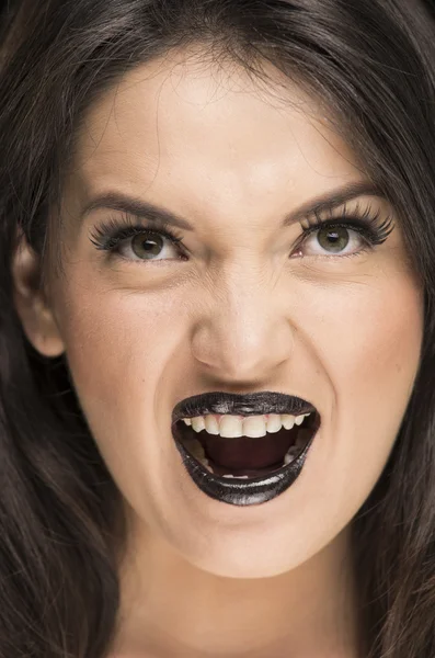 Skrämmande ung kvinna som bär goth makeup — Stockfoto