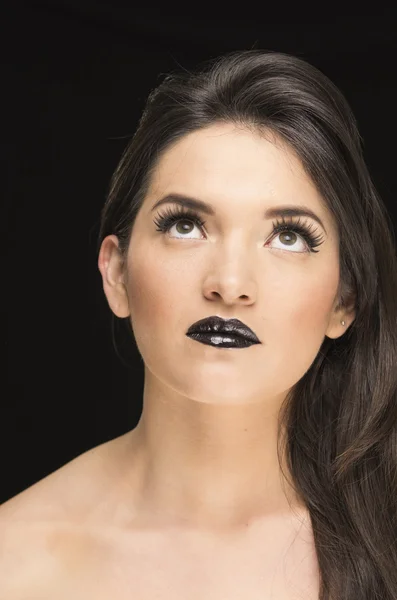 Beautiful young woman wearing goth makeup — Stock Photo, Image