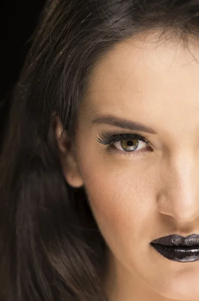 Beautiful young woman wearing goth makeup — Stock Photo, Image