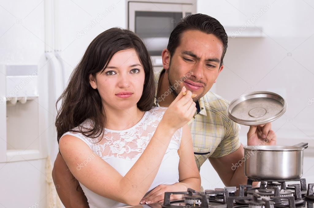 attractive couple cooking together unpleasant meal