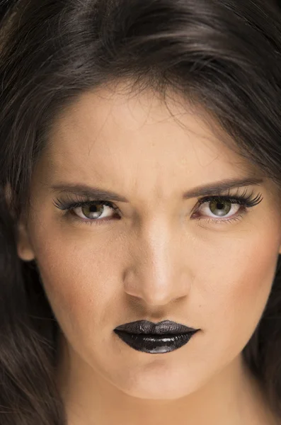 Beautiful young woman wearing goth makeup — Stock Photo, Image