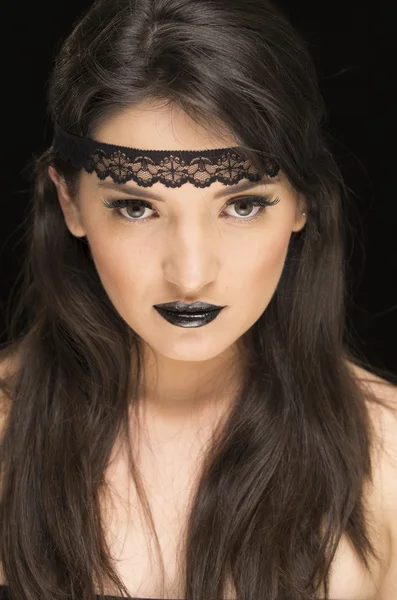 Beautiful young woman wearing goth makeup — Stock Photo, Image