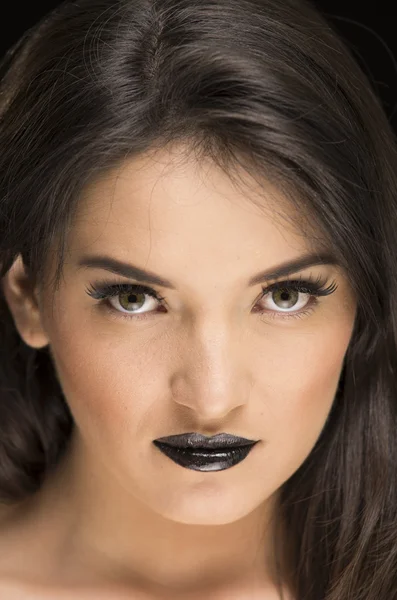 Beautiful young woman wearing goth makeup — Stock Photo, Image