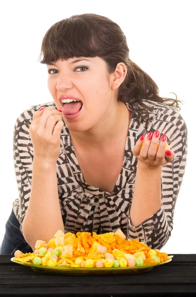 Young girl overeating junk food — Stock Photo, Image