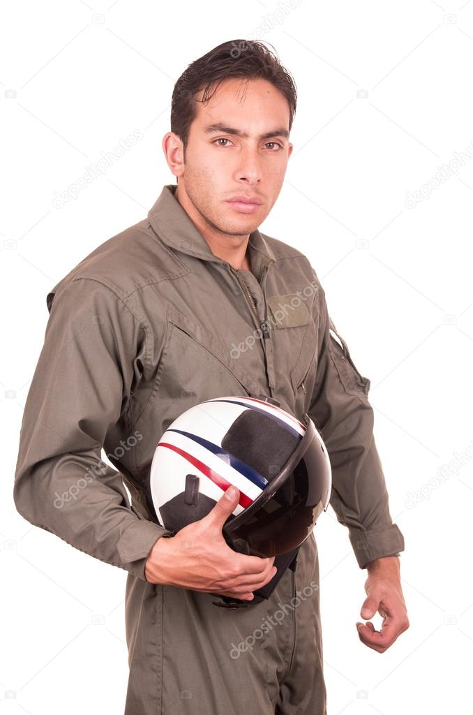 young male hispanic pilot holding helmet