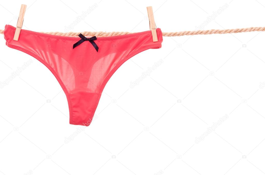 red panties hanging on a rope clothesline