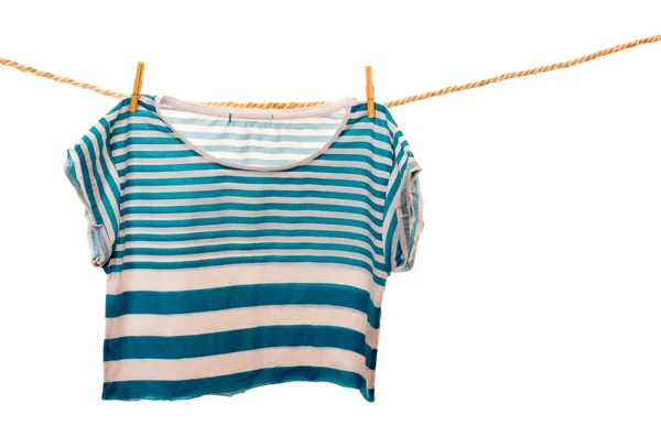 Blue tshirt hanging on a rope clothesline — Stock Photo, Image