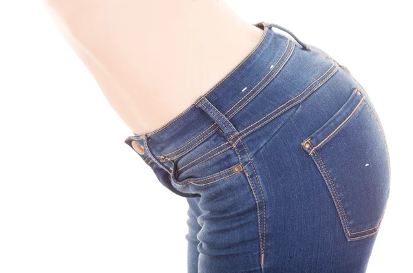 Mooie jonge slanke topless vrouw dragen van jeans tonen buik — Stockfoto
