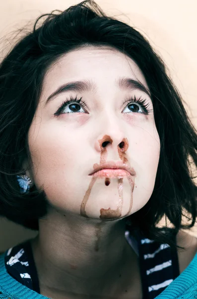 Young beautiful upset girl nosebleeding — Stock Photo, Image