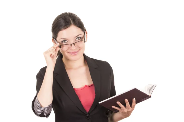 Porträt einer hübschen Lehrerin mit Brille und Buch in der Hand — Stockfoto