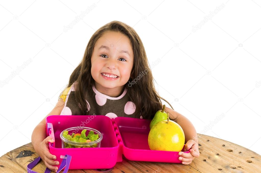 Cute little brunette girl with her healthy lunchbox
