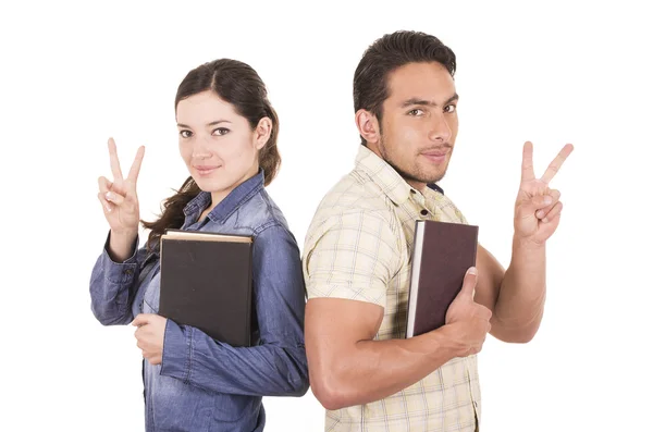 Couple of cheerful happy attractive students holding book — Stock Photo, Image