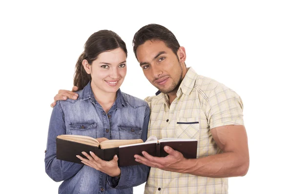 Couple of cheerful happy attractive students holding book — Stock Photo, Image