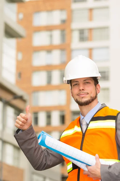 Young handsome architect supervising a construction — Stock Photo, Image