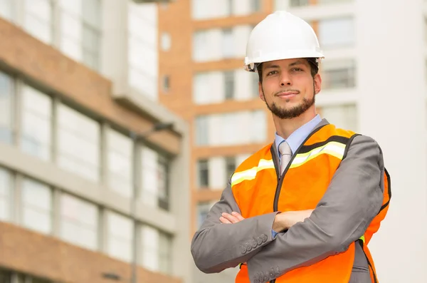 Young handsome architect supervising a construction — Stock Photo, Image