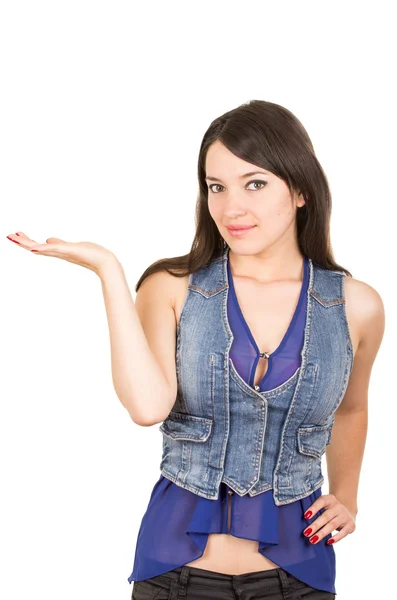 Beautiful young girl wearing blue crop top posing pointing to the side — Stock Photo, Image