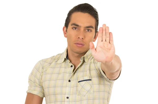 Young handsome hispanic man posing gesturing stop — Stock Photo, Image