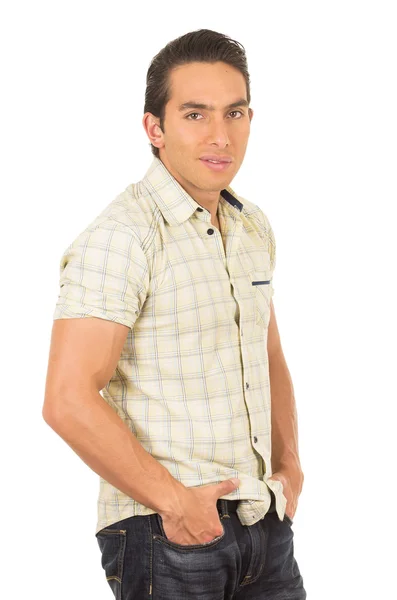 Young handsome hispanic man posing with hands in pockets — Stock Photo, Image