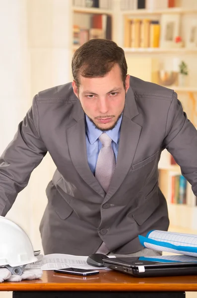 Young handsome architect working in an office — Stock Photo, Image