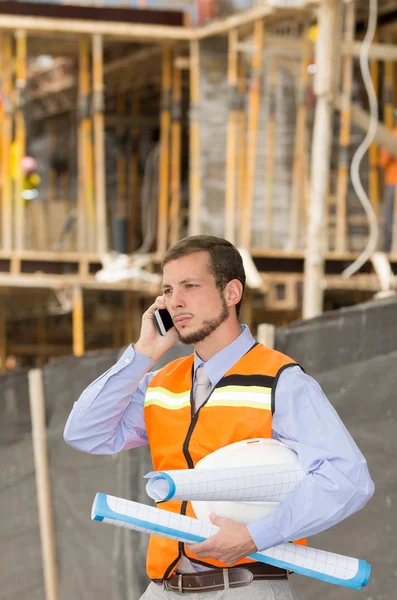 Young handsome architect supervising a construction — Stock Photo, Image