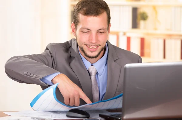 Young handsome architect working in an office — Stock Photo, Image