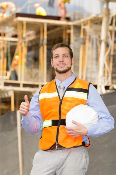 Young handsome architect supervising a construction — Stock Photo, Image