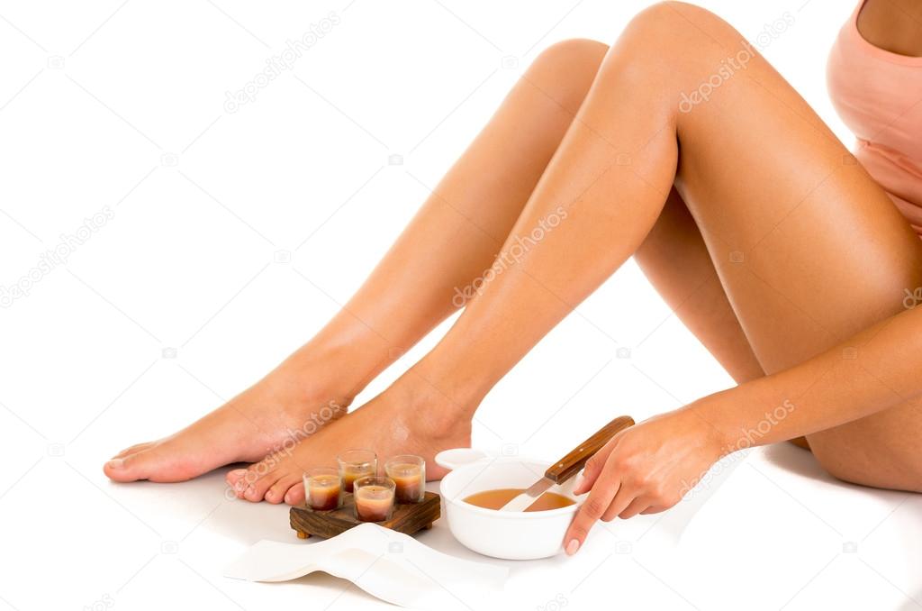 Beautiful young latin woman with silky skin, concept of leg waxing