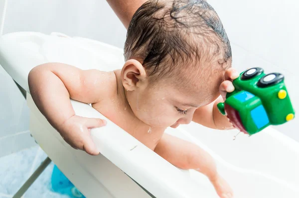 Playful baby boy having a bath — Stock Photo, Image