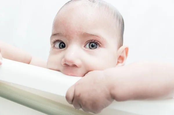 Close up of baby boy face during bath — Stock Photo, Image