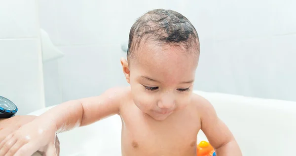 Cute baby boy in the bathtub — Stock Photo, Image