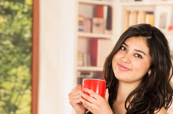 Hispanic model with coffee cup — Stock Photo, Image