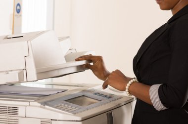 Office woman working copy machine