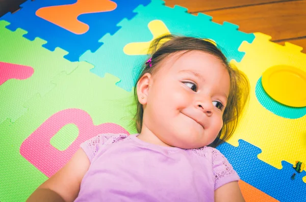 Beautiful baby girl lying down — Stock Photo, Image