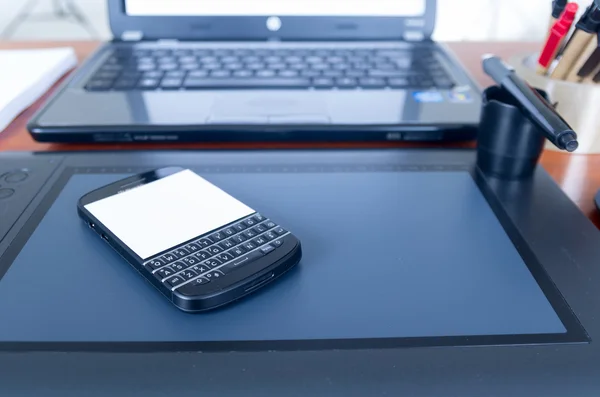 Desk and digital devices — Stockfoto