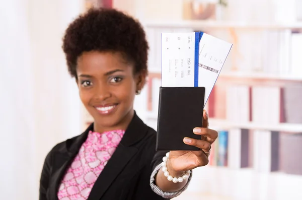Black office woman tickets and passport — Stock fotografie